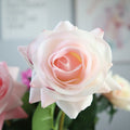 Silk artificial rose flower in red, 42cm long with 8.5cm fabric flower head on plastic stem.