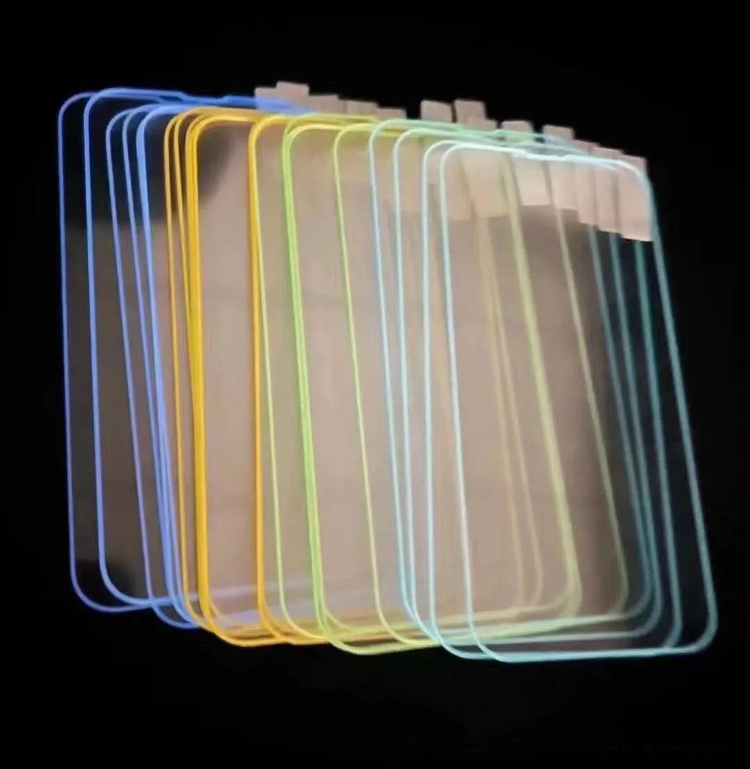 Fluorescent luminous tempered glass screen protector for iPhone on a phone.