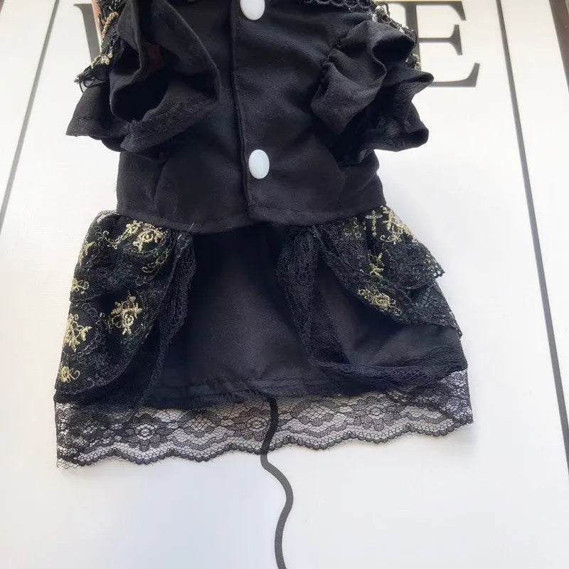 Golden gothic-style skirt costume for a small dog or cat on a mannequin.