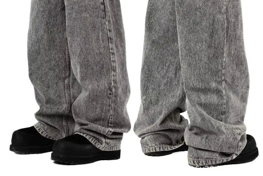 Grey loose straight-leg cotton denim trousers on mid-waist