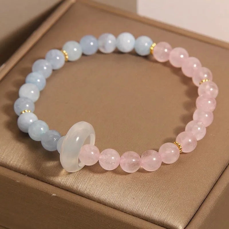 Women's aquamarine dopamine bracelet with pink blue beads and geometric round elements