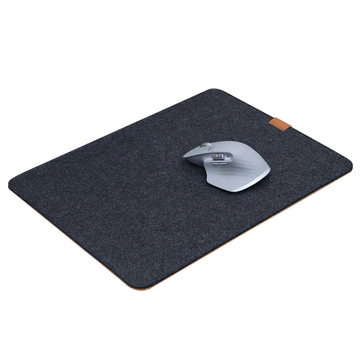 Simple grey felt and cork desk mat in an oversized rectangle shape on a wooden desk.