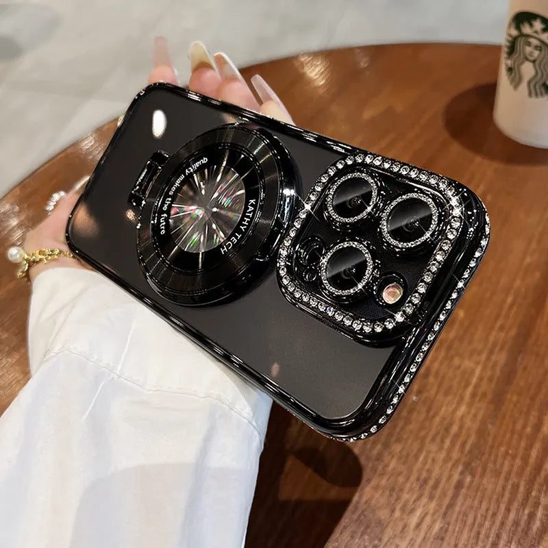 Transparent silicone phone case with rhinestone frame and built-in magnetic bracket for Apple iPhone.