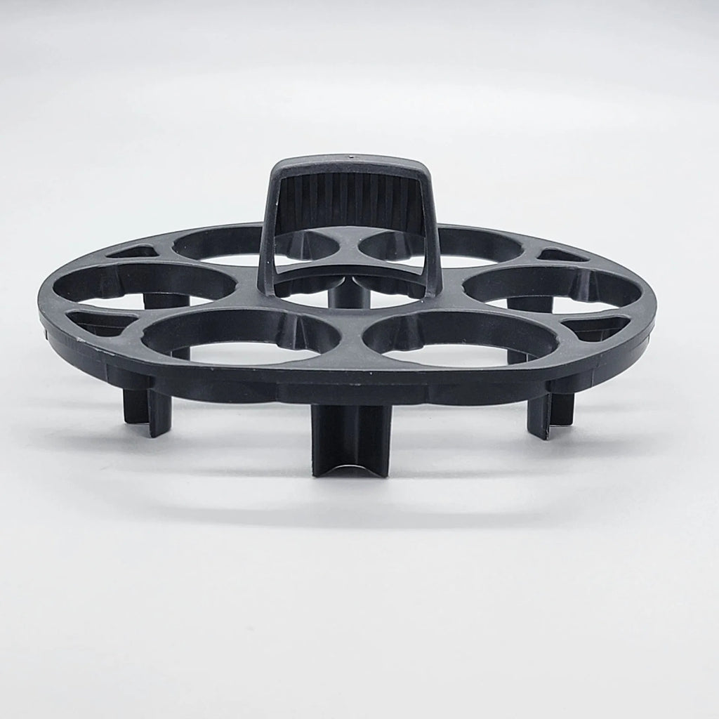 Black plastic egg holder basket for kitchen storage on a white background.