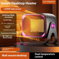 Compact white desktop ceramic heater with push buttons on a wooden desk.