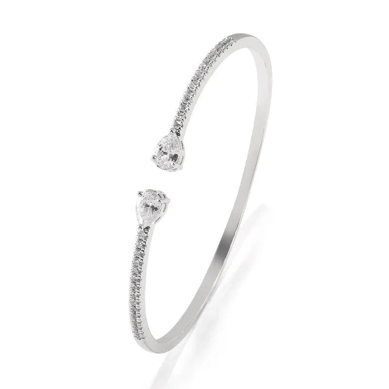 Copper bracelet with inlaid white or blue zircon crystals, simple fashion jewellery design