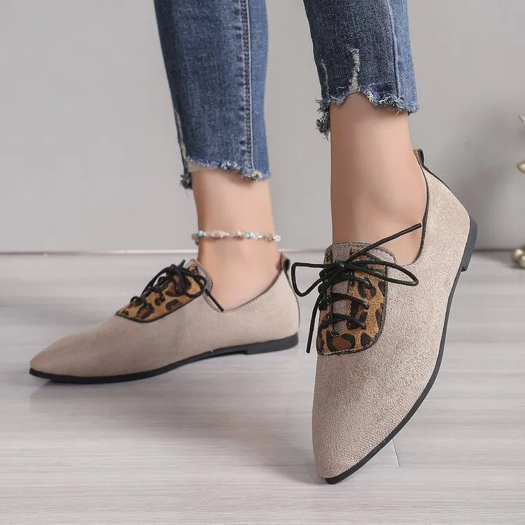Beige leopard print pointed toe pumps for women in plus sizes, shown on a white background.