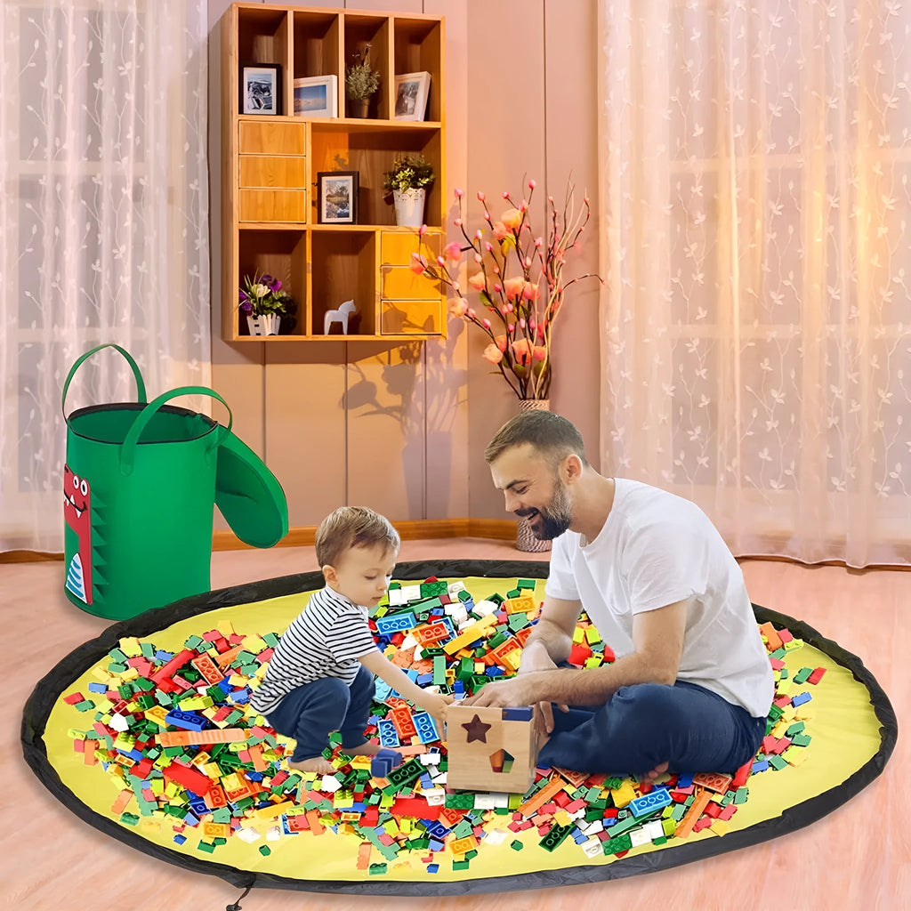 Green felt cube storage bag open as play mat with toys inside and pull rope visible