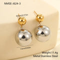 Pair of round bead stud earrings with gold plating and colour-block design on a woman's earlobe.