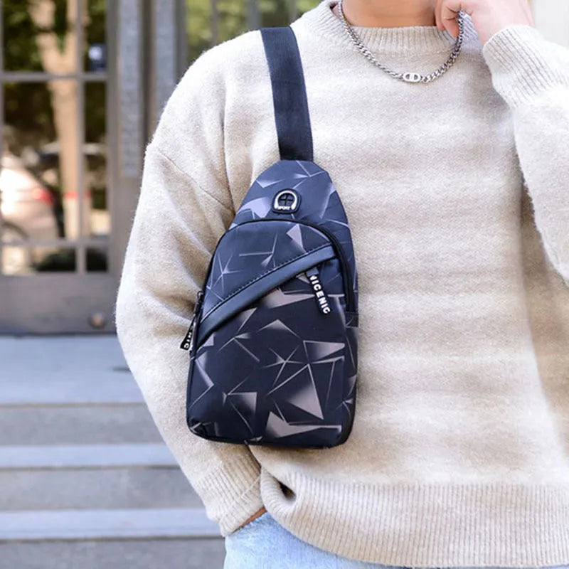 Men's crossbody messenger bag with earphone hole in Oxford cloth, showing zipper opening and shoulder strap