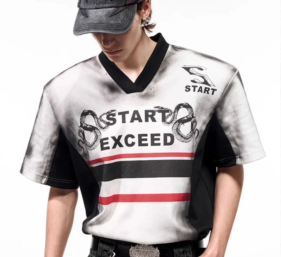 Women's short sleeve V-neck polyester shirt with snake letter print and padded shoulders.
