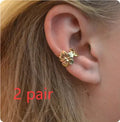 Women's gold starfish conch earrings with beach animal design on alloy material