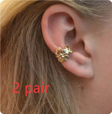 Women's gold starfish conch earrings with beach animal design on alloy material