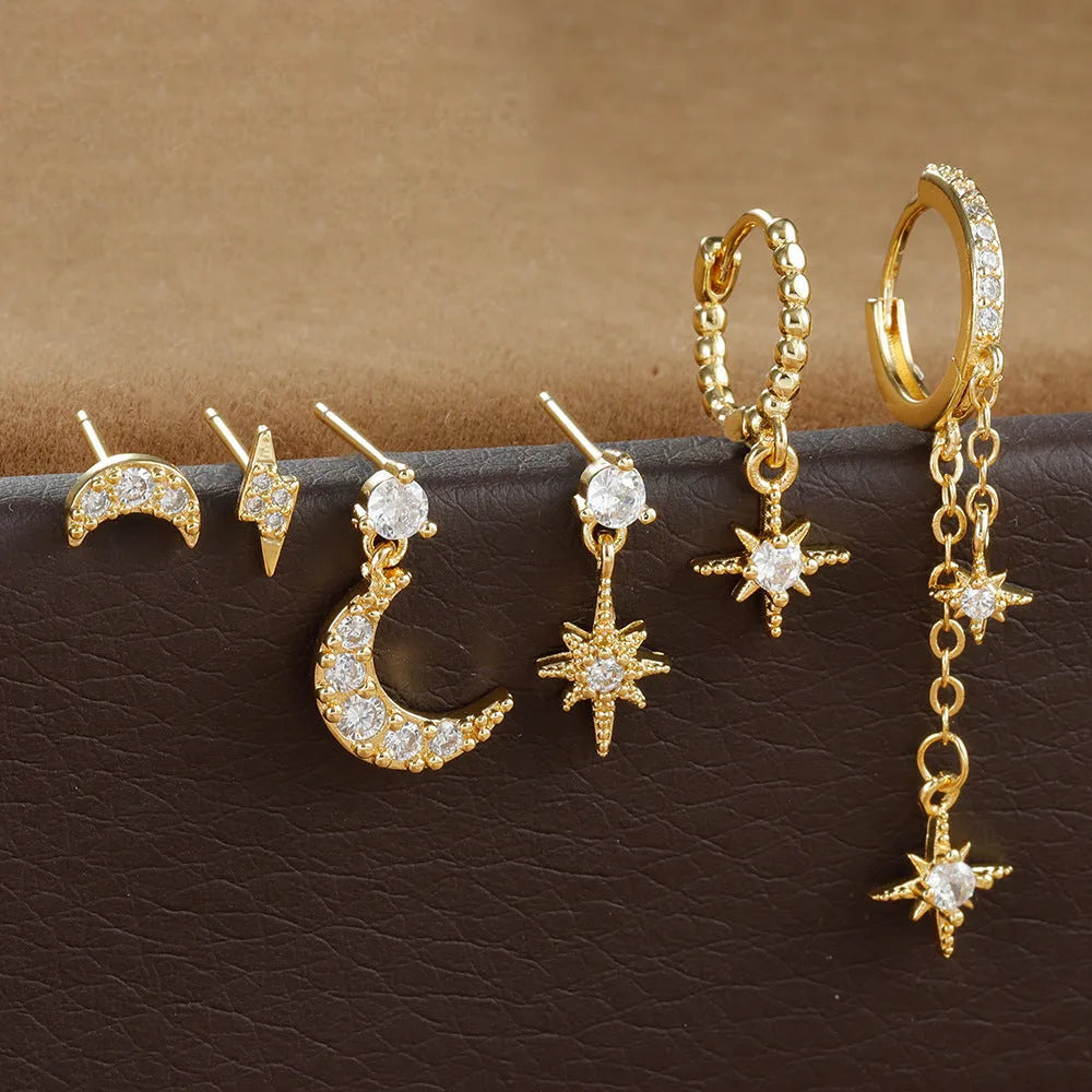 Gold electroplated chain tassel earrings set with six pieces including zircon stud accents