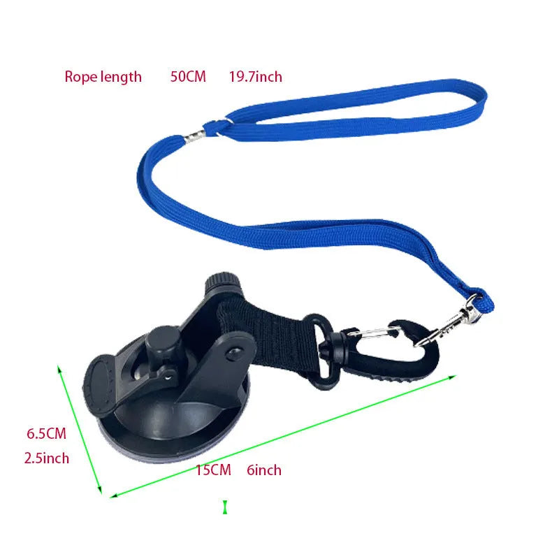 Black pet bathing restraint with four suction cups, a traction rope, and anti-bite handcuffs on a tiled wall.