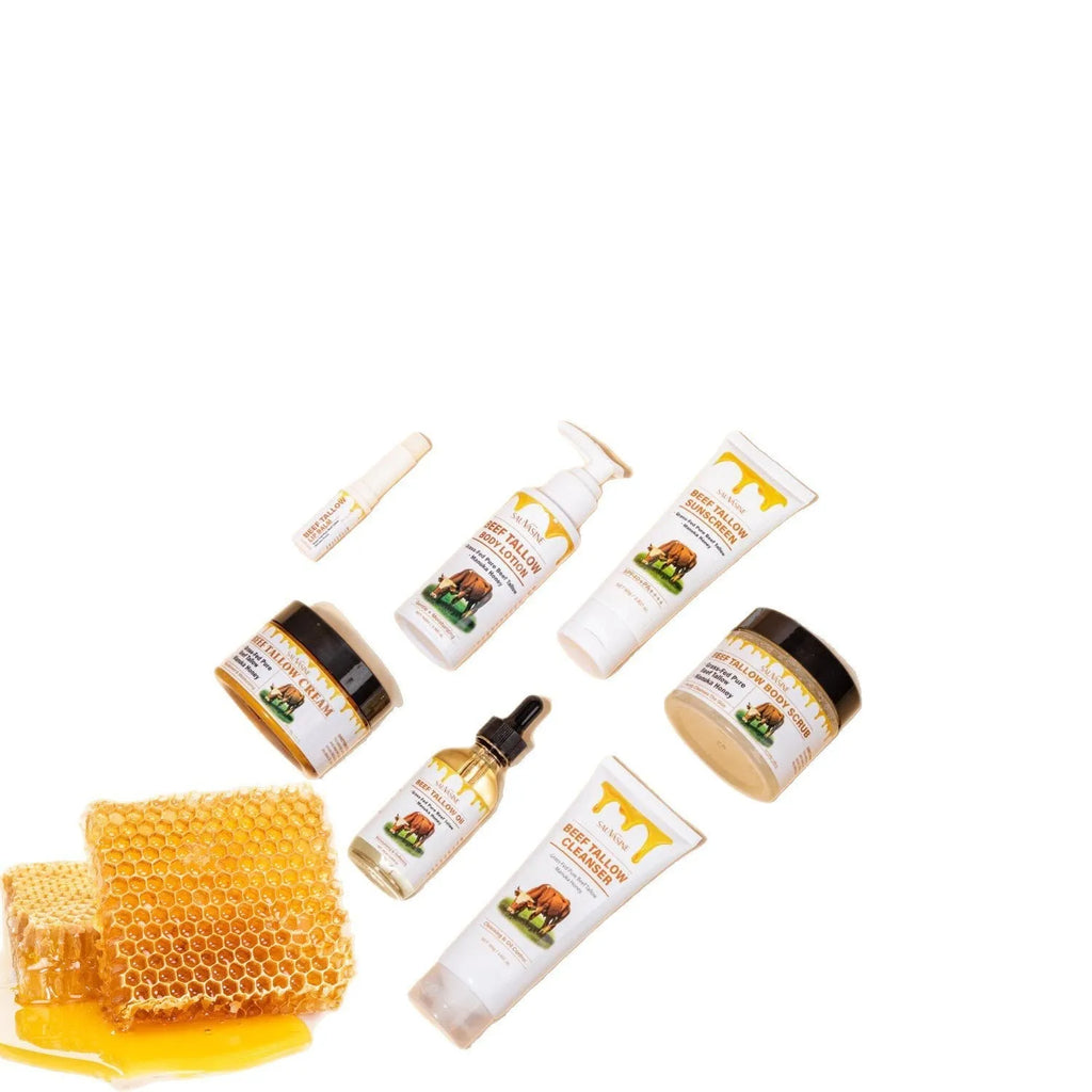 Seven-piece facial care set showing cleanser, cream, lotion, scrub, lip balm, protective cream and beef tallow balm