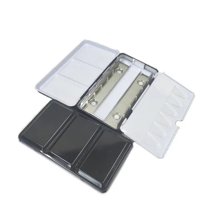 Solid tinplate folding paint box for watercolour paints shown in square shape.