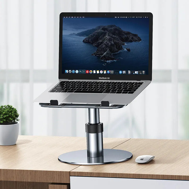 Silver aluminium car laptop stand shown at an adjusted height on a surface.