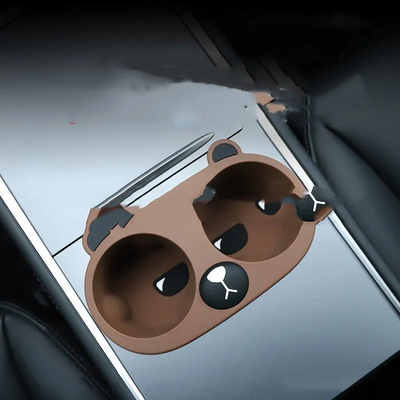 Flexible silicone car cup holder stabiliser insert in grey, tan, or pink colour.