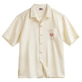 Light apricot men's Cuban collar shirt with bamboo and floral pattern
