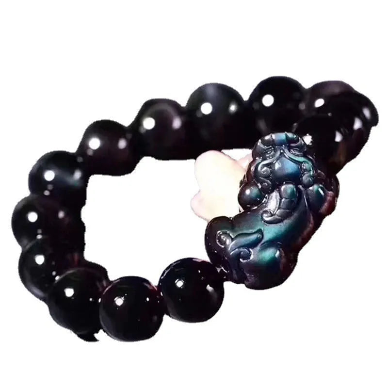 Natural ice colour eye obsidian crystal bracelet showing marbled patterning on beads