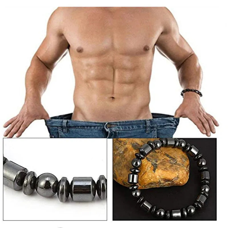 Black pentagram stone magnetic therapy bracelet with stretch fit on a wrist.