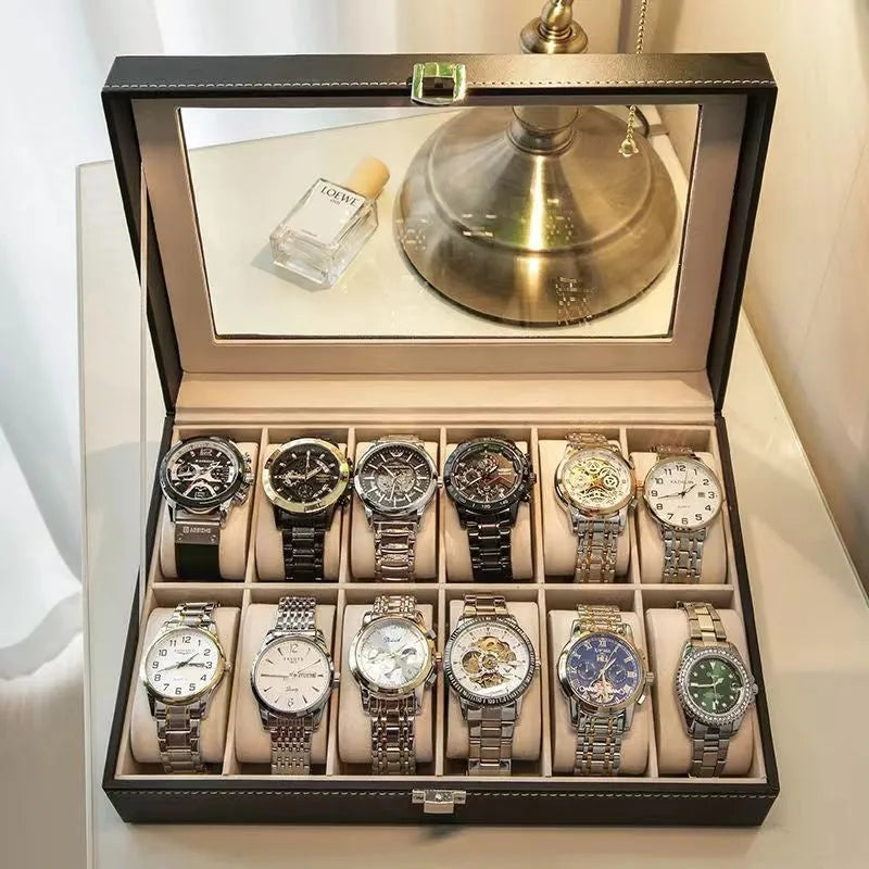 Grey high-grade leather watch storage box with a transparent see-through lid on a wooden surface.