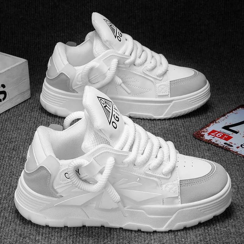 Men's white chunky sneakers with cartoon design, thick rubber sole, and lace-up front.