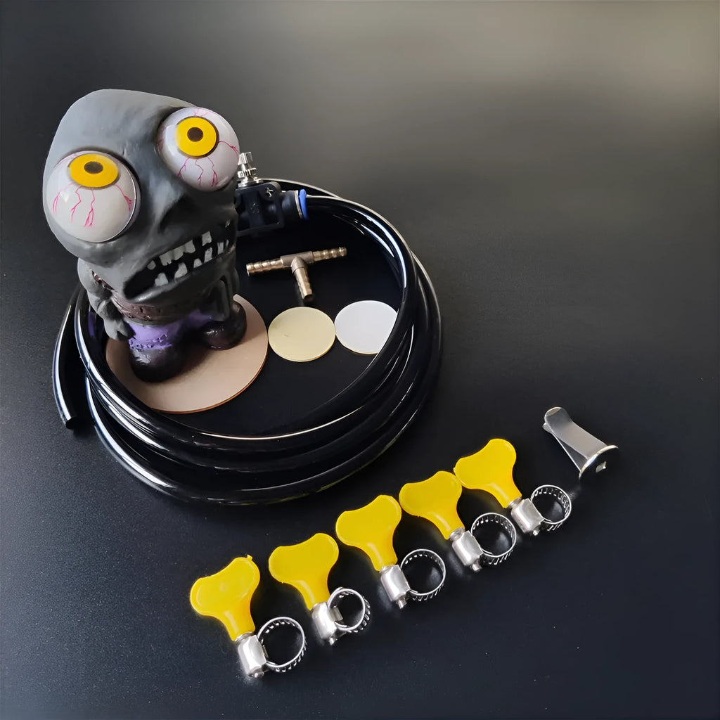 Adjustable turbo car boost eye doll ornament kit with pressure valve, copper tube, and mounting clips on a white background.
