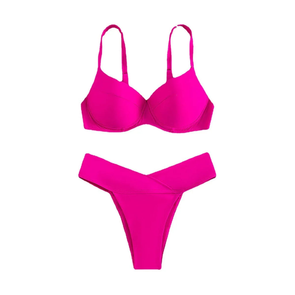 Women's solid colour nylon bikini swimsuit in fluorescent pink on a mannequin.