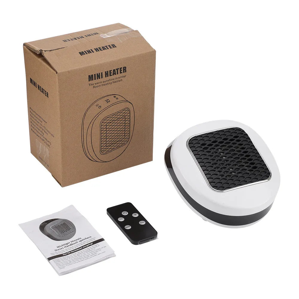 White ceramic portable electric heater with remote control on a table.