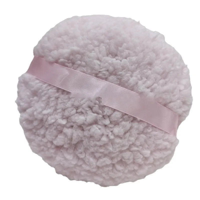 Oversized rectangular plush powder puff for face makeup on a white background.