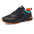Men's black and orange breathable mesh running shoe with lace-up front and rubber sole, shown in plus sizes.