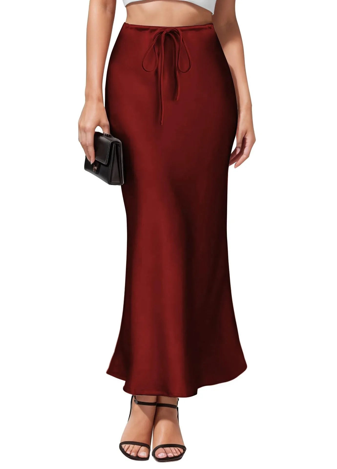 Women's high waist asymmetric acetate skirt with irregular stitching detail in black.