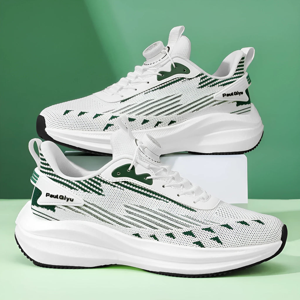 Men's low-top white green sports running shoe with rotating buckle and lace-up closure on a TPU sole.