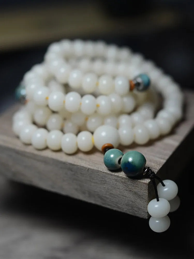 White jade bodhi root bracelet with 108 flat round beads in unisex national style.
