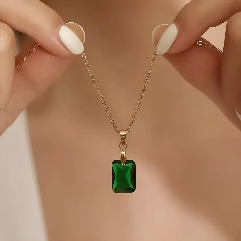 Copper necklace with green rectangular geometric quadrilateral pendant on O-ring chain.