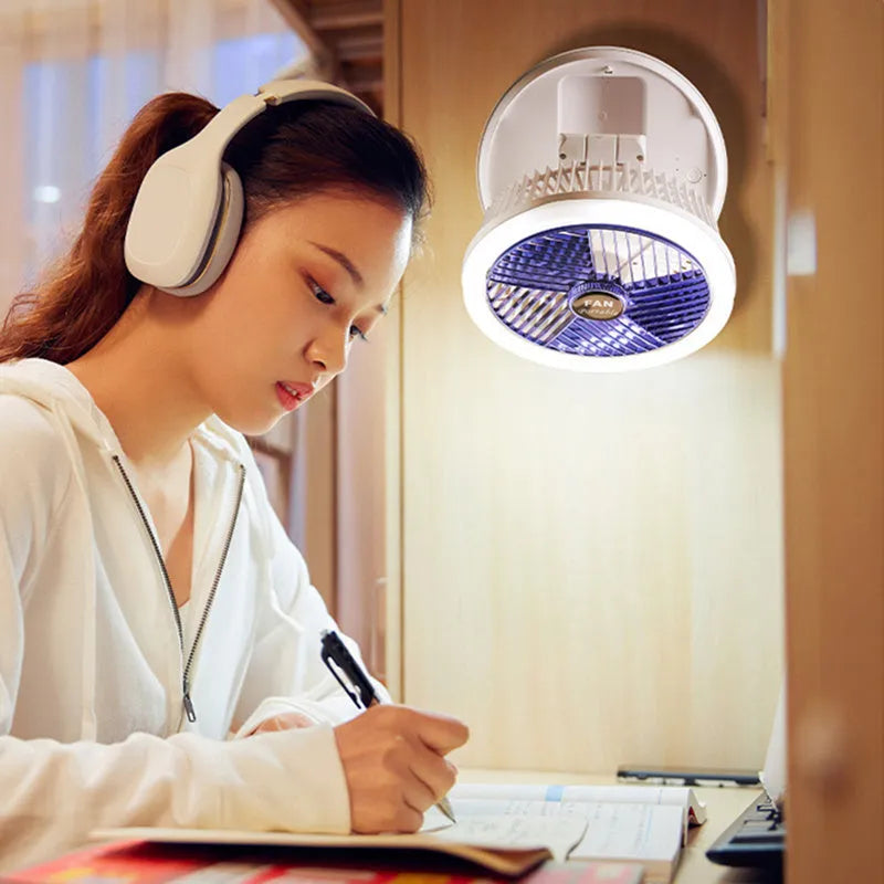 Blue USB charging foldable table fan with LED light showing wall mounting option and 300° tilt adjustment
