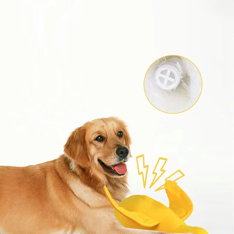 Yellow teddy dog training toy with integrated duck doll and food leak compartments
