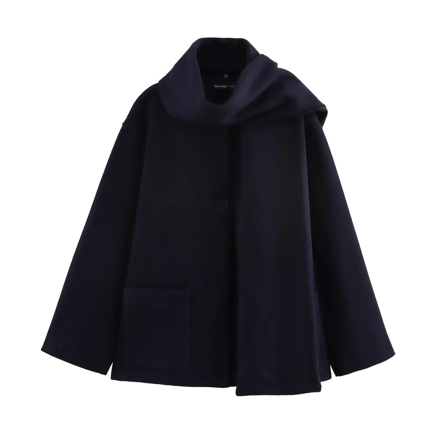 Women's long grey polyester overcoat with artificial fur collar and pockets, shown in a street fashion style.