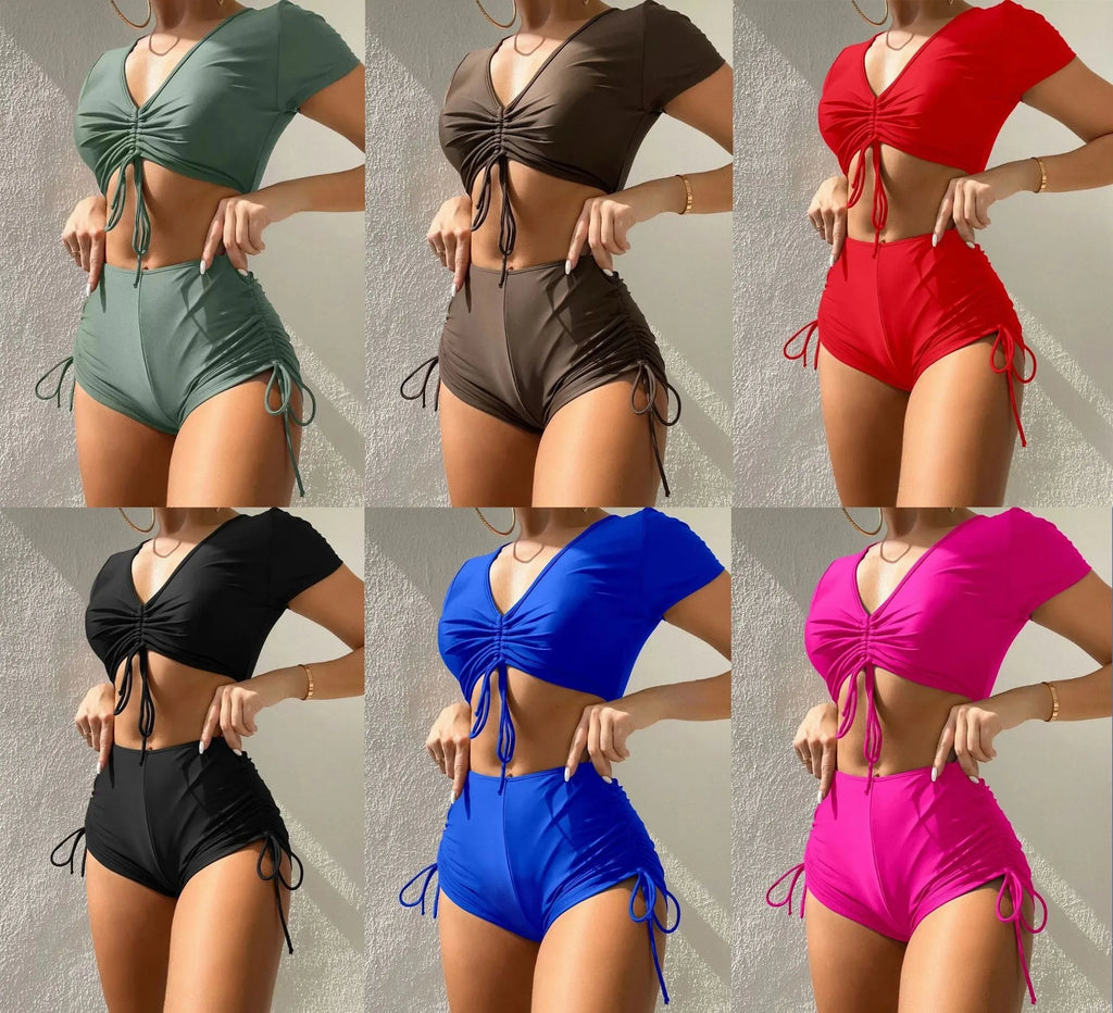 Women's two-piece lace-up bow swimsuit set in dark green, showing top and shorts.