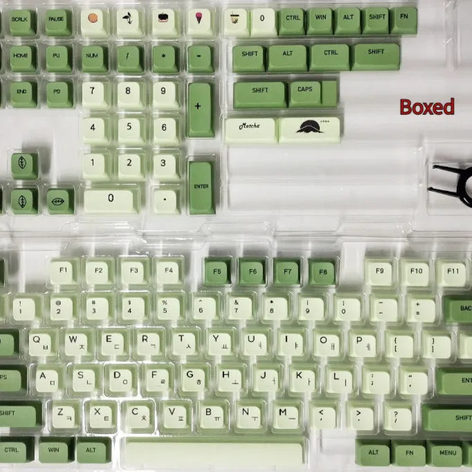 Full set of 124 matcha green PBT keycaps for a mechanical keyboard, showing various international layout options.