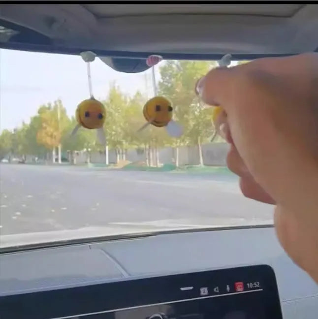 Square fur ball cartoon bee car decoration with black and yellow colours