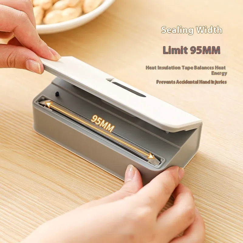 Small portable mini sealing machine in white or blue colour for heat sealing plastic food bags