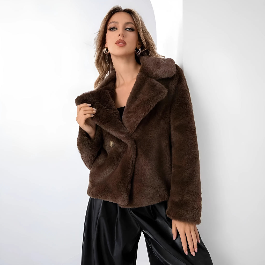 Women's short loose faux fur coat in rose red colour with regular sleeves.