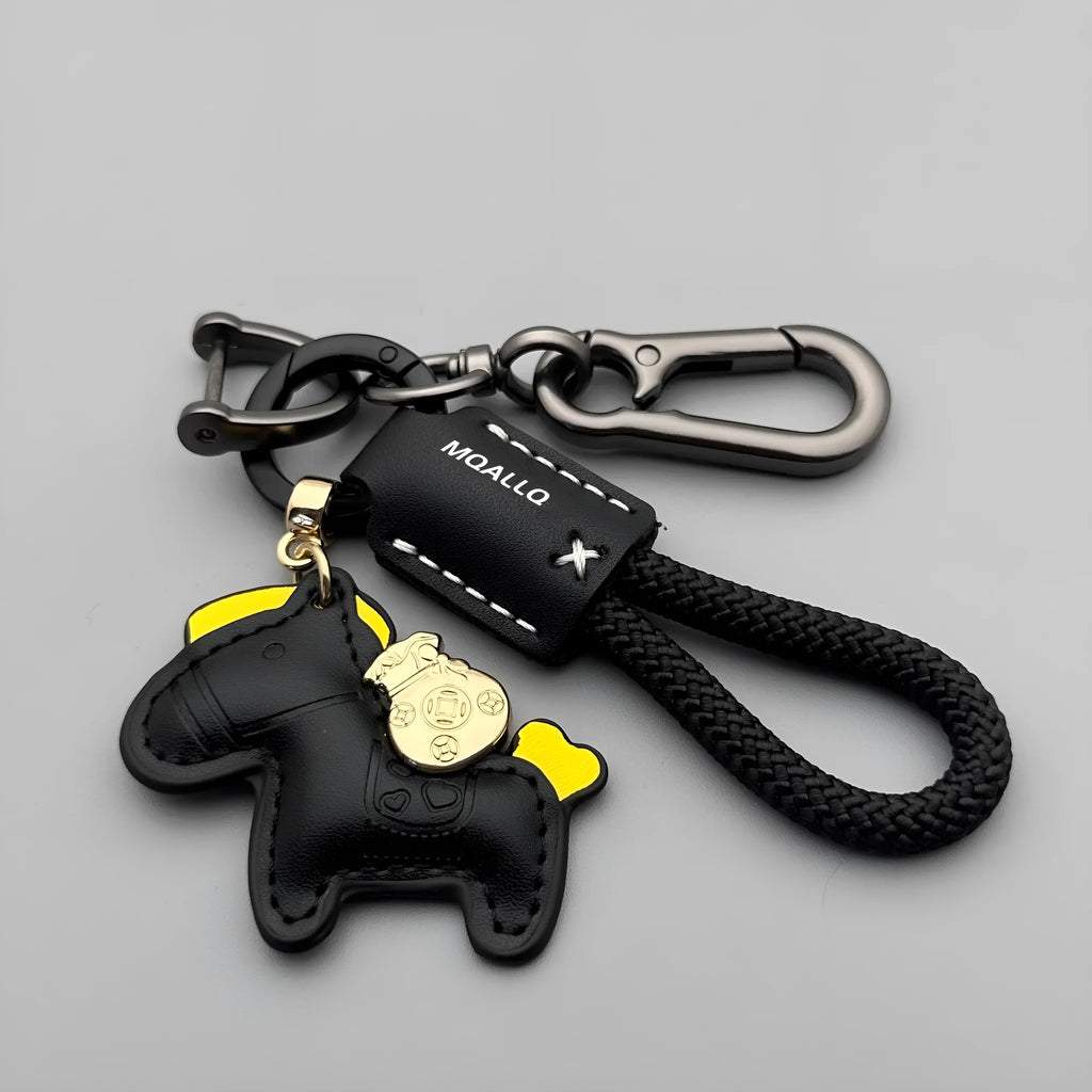Handmade zinc alloy cowhide car key pendant on a flannel rope strap in various colour options.