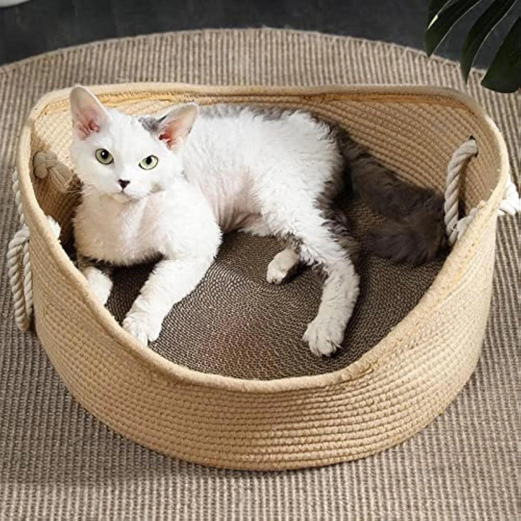 Wicker-style cat bed basket with a corrugated scratching board inside.