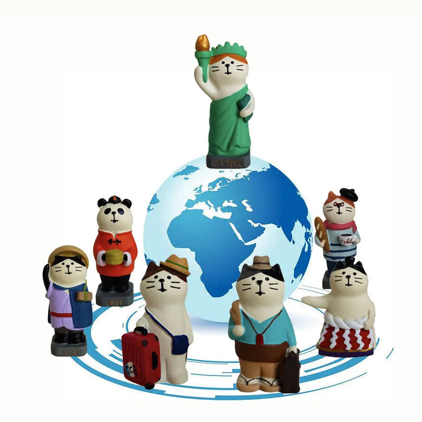Cartoon style Statue of Liberty cat resin figurine craft on display surface.