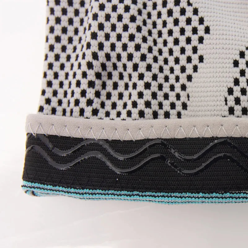 Sky blue elastic fibre knee pad for sports, shown in size S, M, L, or XL.