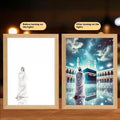 Modern rectangular LED light painting picture frame with USB cable, showing example of a sea theme design.